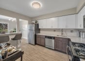 Thumbnail 5 of 41 - Well Equipped Kitchen at Rochester Club Apartments - Rochester, MI, Michigan