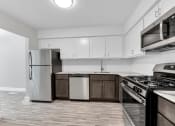 Thumbnail 3 of 41 - Fully Equipped Kitchen at Rochester Club Apartments - Rochester, MI, Rochester Hills, Michigan