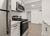Thumbnail 4 of 21 - Fully Equipped Kitchen Includes Frost-Free Refrigerator, Electric Range, & Dishwasher  at Park On Canal Apartments, Clinton Twp, Michigan