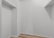 Thumbnail 13 of 73 - an empty room with white walls and a wooden floor