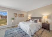 Thumbnail 25 of 41 - Bedroom With Expansive Windows at Rochester Club Apartments - Rochester, MI, Michigan, 48306