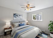 Thumbnail 25 of 28 - A bedroom with a bed, nightstand, and a ceiling fan.