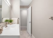 Thumbnail 18 of 41 - Renovated Bathrooms With Quartz Counters at Rochester Club Apartments - Rochester, MI, Rochester Hills