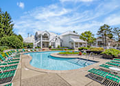 Thumbnail 66 of 87 - Resort style pool with spa and sundeck at Village Club of Farmington Hills Apartments, Farmington Hills