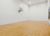 Thumbnail 78 of 87 - Indoor racquetball court with basketball hoop at Village Club of Farmington Hills Apartments, Farmington Hills, MI 48331