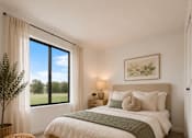 Thumbnail 15 of 30 - A bedroom with a large bed and a window overlooking a green field. at Park On Canal Apartments - Clinton Twp, MI Apartments, Clinton Twp