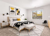 Thumbnail 10 of 29 - A bedroom with a large bed, a chair, and a window with blinds.