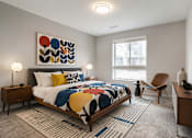 Thumbnail 12 of 58 - A bedroom with a large bed and a colorful abstract painting above it.