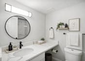 Thumbnail 8 of 44 - A bathroom with a white sink and toilet. at The Park on 13 Apartments - Royal Oak, MI Apartments, Royal Oak, Michigan