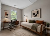 Thumbnail 50 of 87 - Modern bedroom with workspace and natural light at Village Club of Farmington Hills Apartments, Michigan, 48331