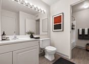 Thumbnail 59 of 87 - Modern bathroom with white vanity and walk-in shower at Village Club of Farmington Hills Apartments, Farmington Hills, MI 48331
