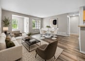 Thumbnail 34 of 87 - Open living and dining space with modern decor at Village Club of Farmington Hills Apartments, Farmington Hills