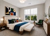 Thumbnail 15 of 39 - A bedroom with a large bed, a chair, and a mirror.