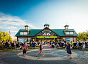 Thumbnail 85 of 87 - Community pavilion with outdoor concert and gathering space at Village Club of Farmington Hills Apartments, Farmington Hills