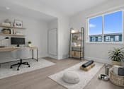 Thumbnail 10 of 14 - A room with a desk, chair, and shelves with various items.