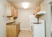 Thumbnail 24 of 58 - Fully Furnished Kitchen at Residences at Grand Blanc Apartments - Grand Blanc, MI, Michigan