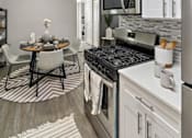 Thumbnail 3 of 58 - Fully Equipped Kitchen at Residences at Grand Blanc Apartments - Grand Blanc, MI, Michigan