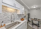 Thumbnail 4 of 58 - Eat In Kitchen at Residences at Grand Blanc Apartments - Grand Blanc, MI, Michigan