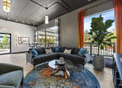 Thumbnail 67 of 73 - a living room with couches and a table at Troy Place Apartments - Troy, MI, Troy, Michigan