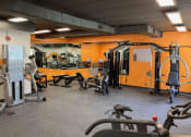 Thumbnail 49 of 73 - an image of a gym with weights and cardio equipment at Troy Place Apartments - Troy, MI, Michigan
