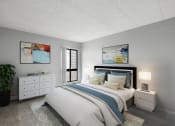Thumbnail 43 of 73 - a bedroom with a bed and a dresser at Troy Place Apartments - Troy, MI, Troy, Michigan