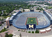 Thumbnail 38 of 39 - An aerial view of a football stadium with the letter M on it.