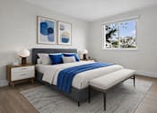 Thumbnail 7 of 14 - A bedroom with a large bed and two nightstands.