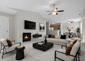 Thumbnail 19 of 87 - Modern living room with fireplace and vaulted ceiling at Village Club of Farmington Hills Apartments, Farmington Hills, MI
