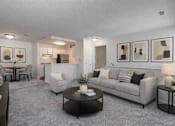 Thumbnail 8 of 24 - A living room with a grey couch, a coffee table, and a dining table with chairs.