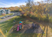 Thumbnail 34 of 34 - an aerial view of a playground at a park with trees