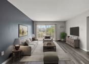 Thumbnail 11 of 34 - a living room with a couch and a coffee table and a television