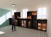 Thumbnail 43 of 44 - A woman is standing in a room with a shelving unit. at The Park on 13 Apartments - Royal Oak, MI Apartments, Apartments, Royal Oak, MI