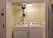 Thumbnail 17 of 17 - A white bathroom with a toilet and sink.