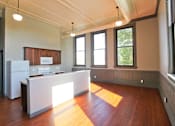 Thumbnail 21 of 25 - This two bedroom apartment makes great use of space and features numerous large windows.