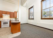 Thumbnail 9 of 19 - A kitchen with a window and a sink.