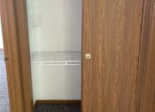 Thumbnail 8 of 13 - A wooden door with a glass panel and a handle.