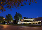 Thumbnail 3 of 28 - a large brick building with trees in front of it