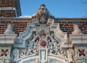 Thumbnail 2 of 27 - A building with a number 1921 on it.