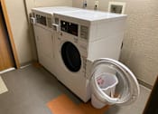 Thumbnail 10 of 10 - Community Plaza Apartments shared laundry