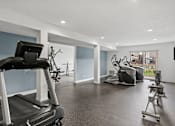 Thumbnail 23 of 45 - Fitness center with weight lifting equipment and cardio equipment at Cityscape, St Louis Park, MN, 55416