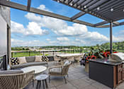 Thumbnail 56 of 61 - The top-floor terrace with grills and fire pits  at The Mera, Minnesota, 55426