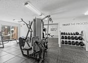Thumbnail 22 of 45 - Fitness center with weight lifting equipment and cardio equipment at Cityscape, St Louis Park, MN, 55416