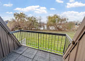 Thumbnail 18 of 42 - Upstairs balcony of the Townhome at Beach South at the Lake in Robbinsdale, MN