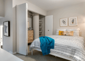 Thumbnail 9 of 25 - a bedroom with a bed and a closet  at The Cosmopolitan, St Paul
