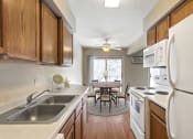 Thumbnail 2 of 13 - Kitchen and Dining Room at Beach South at the Lake, Minnesota, 55422