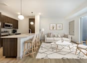 Thumbnail 18 of 61 - Living and kitchen area at The Mera, St Louis Park, MN