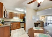 Thumbnail 4 of 18 - Dining And Kitchen at Cedars Lakeside, Little Canada, Minnesota