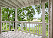 Thumbnail 18 of 45 - the view from the porch of a house overlooking a lake at Cityscape, St Louis Park, MN, 55416