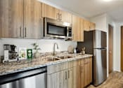 Thumbnail 2 of 30 - Kitchen and Dishwasher with Updated Appliances at Eden Commons, Eden Prairie, Minnesota