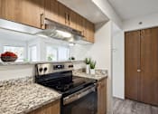 Thumbnail 1 of 30 - Kitchen and Electric Stove at Eden Commons, Minnesota, 55344